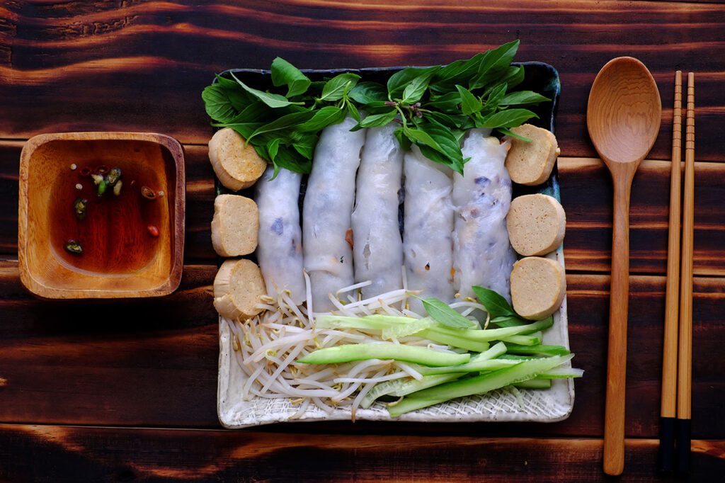 Additionally, a widely used term in Vietnamese vegetarian circles is "ăn chay giả mặn" (meat-like veggie foods), which are made 100% from non-meat ingredients but shaped like seafood or meat.