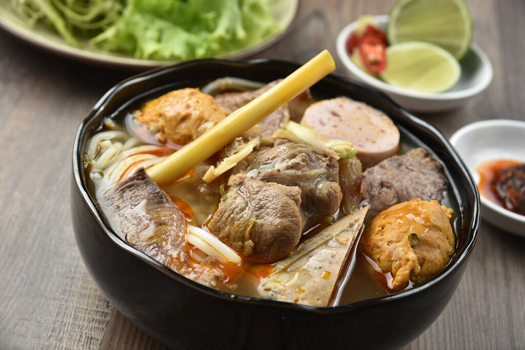 A bowl of Bun Bo Hue requires many ingredients and a meticulous cooking process.