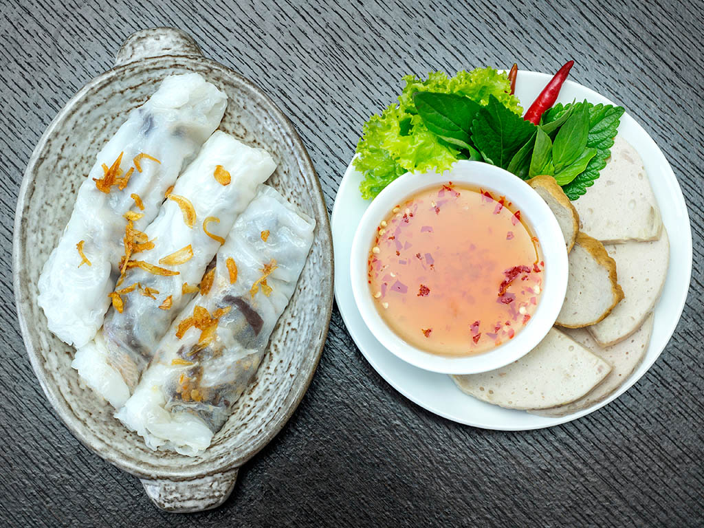 Banh cuon is a preferable breakfast, a must-try dish to really understand the variety and diversity of Vietnamese cuisine.